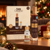 TanOrganic Radiance & Renew gift set with Self Tan Lotion and Anti Ageing Facial Tan Serum beside a Christmas tree and lit fireplace.